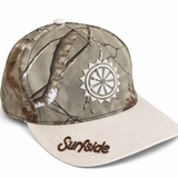 Side right view of the camo hat showcasing the embroidered Sun logo along with the Surfside logo