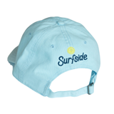 Light blue cap with 'Surfside' logo on the back with metal close feature on a white background