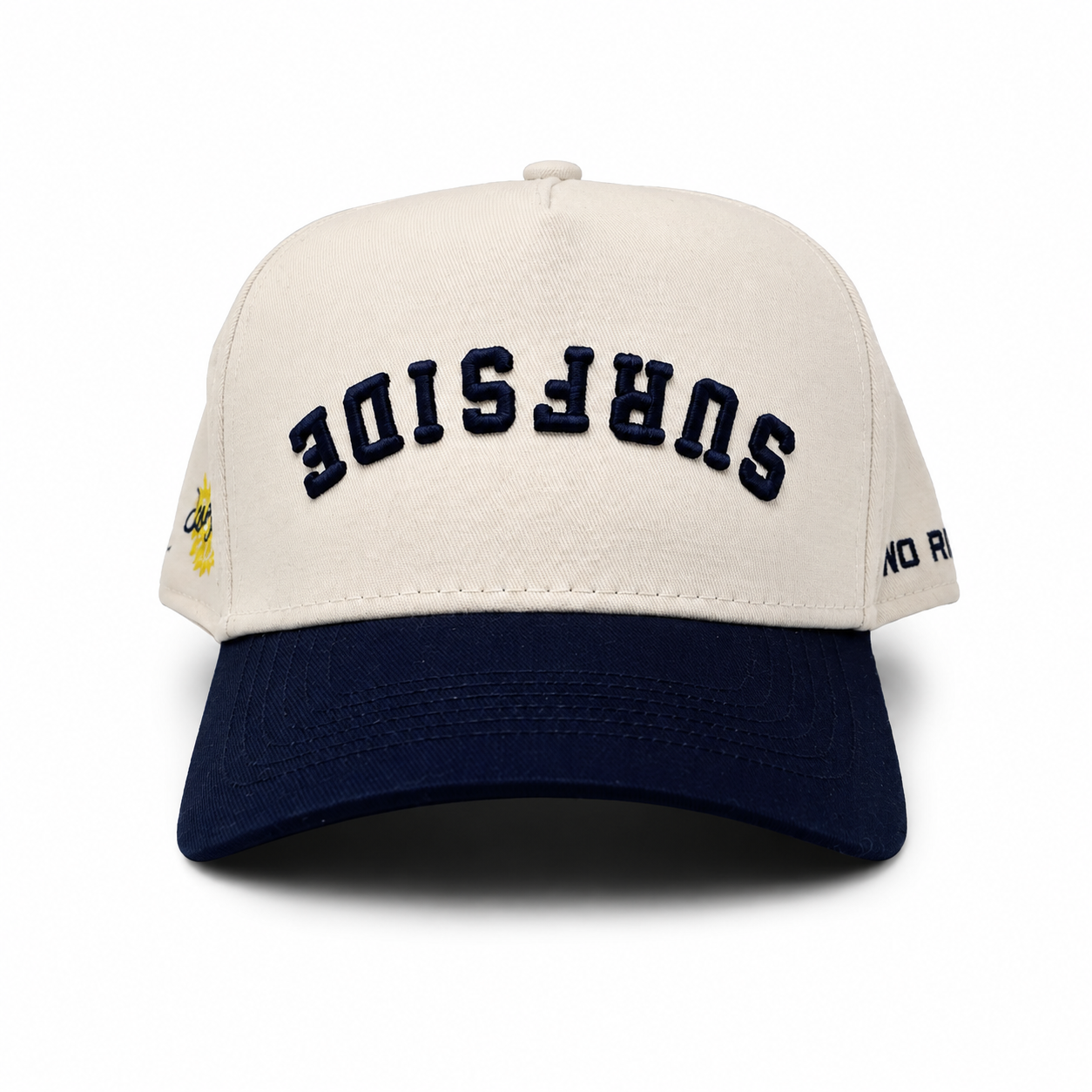 Beige and navy cap with 'Surfside' text on a white background, Surfside logo on the right side and No Rivals text on the left