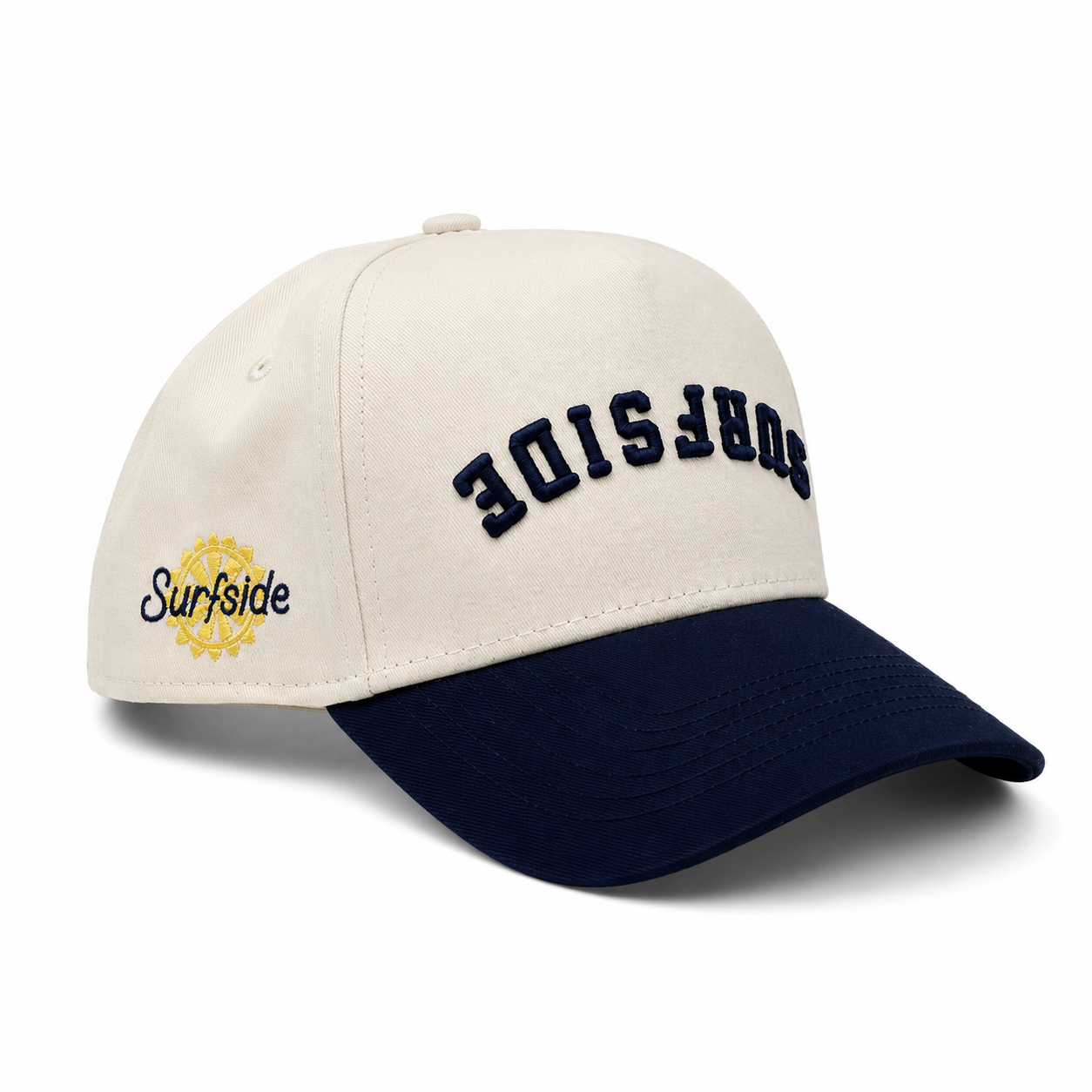 Beige and navy cap with 'Surfside' upside down text and the Surfside logo laying on a white background