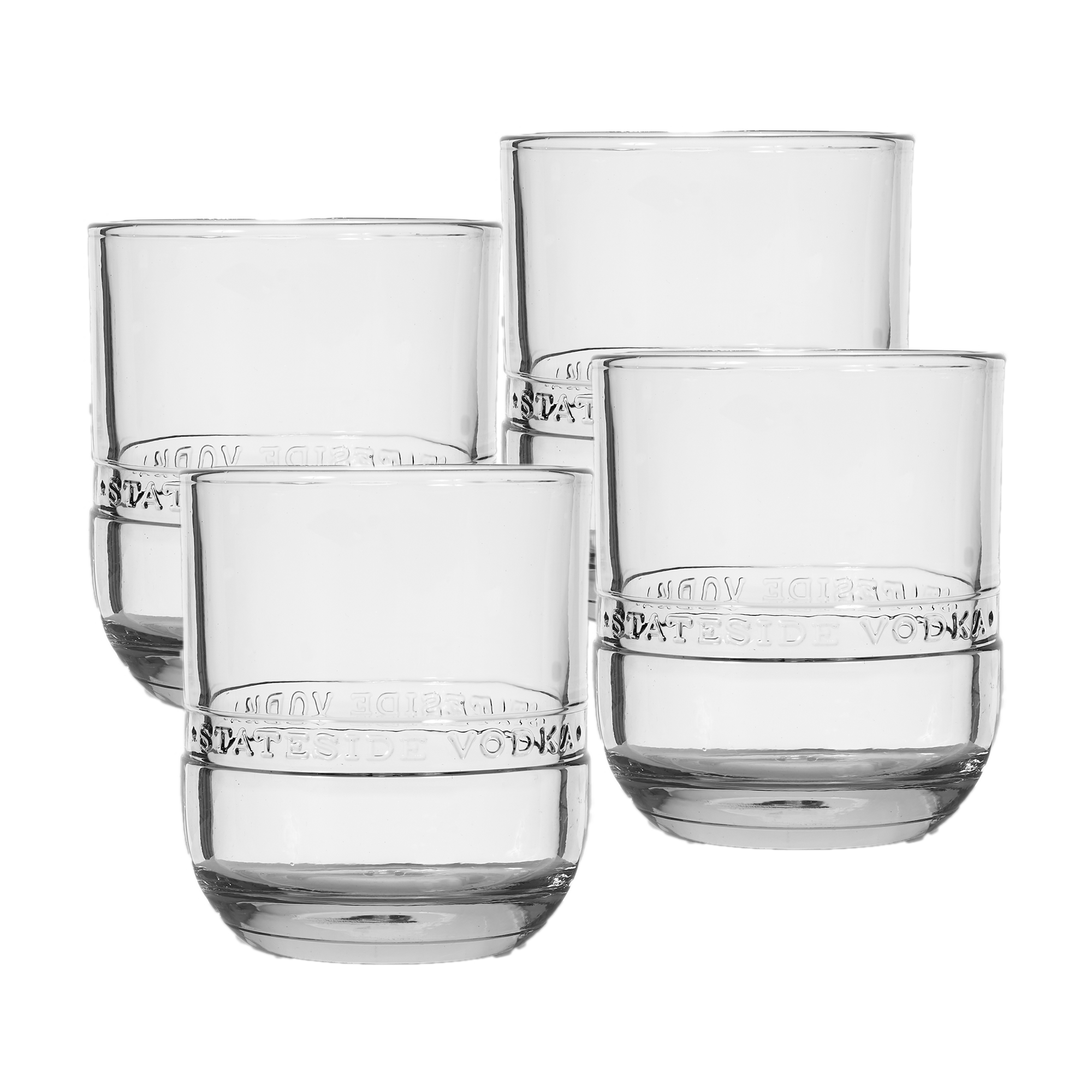 A set of four clear Stateside Vodka bottle rocks glasses with engraved Stateside Vodka on them.