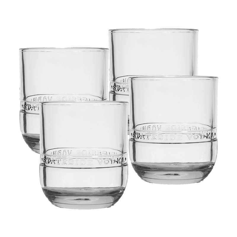 A set of four clear Stateside Vodka bottle rocks glasses with engraved Stateside Vodka on them.