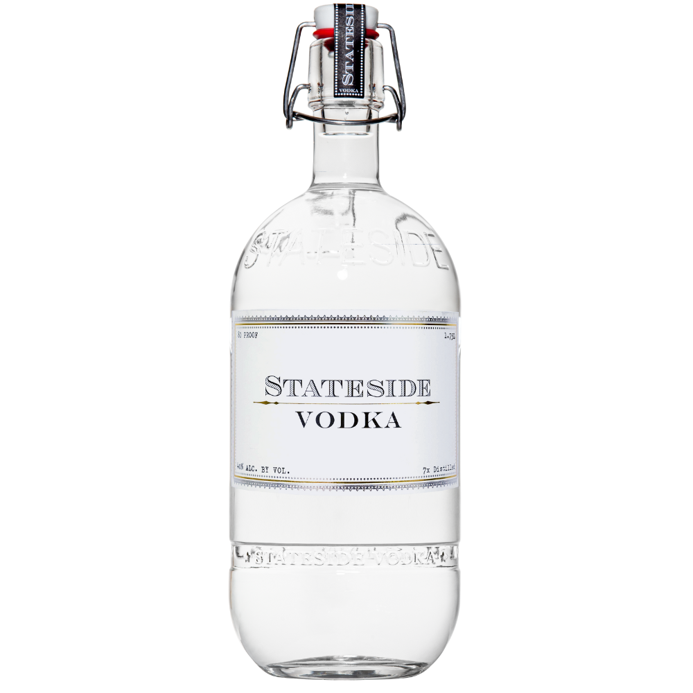 1.75 Liter Stateside Vodka bottle with gold label and swing top lid on a white background