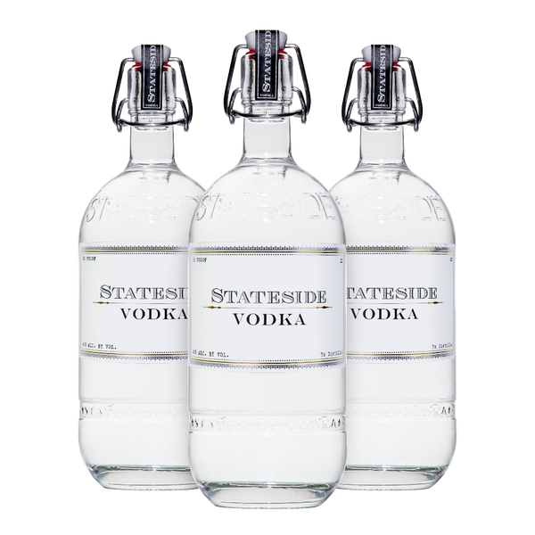 Three bottles bundle of Stateside Vodka 1 liter on a white background