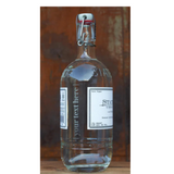 A clear glass bottle of Stateside vodka with a swing top lid, featuring a label and a custom laser-engraved design on the front.