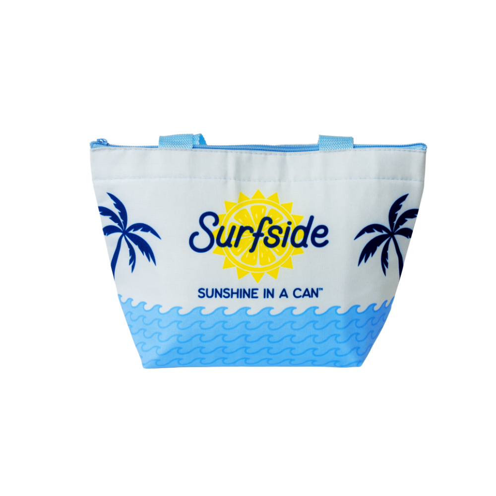 A white cooler bag with blue accents and the text 'Surfside' along with a graphic of a sun and palm trees. It also has the phrase 'Sunshine in a can' printed on it.