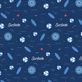 Close up of the Hawaiian inspired Surfside print featuring red crabs, Surfside sun, beach balls, birds, and waves