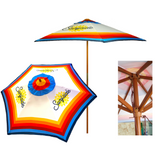 A colorful outdoor umbrella with a geometric stripped pattern featuring the Surfside logo, displayed in an outdoor setting.