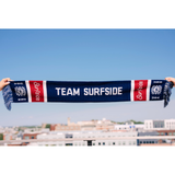 Team Surfside USA 250 Themed Soccer Scarf with the Surfside logo and the Surfside Sun logo with Fringe. This scarf is red, white and blue